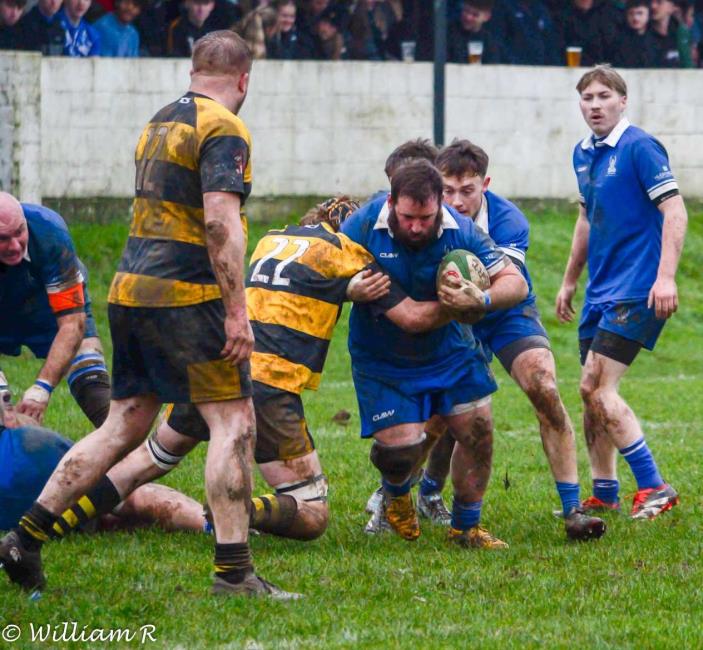 Jamie Zambas drives forward for The Blues